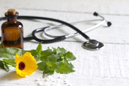 32857103 - alternative medicine herbs and stethoscope concept